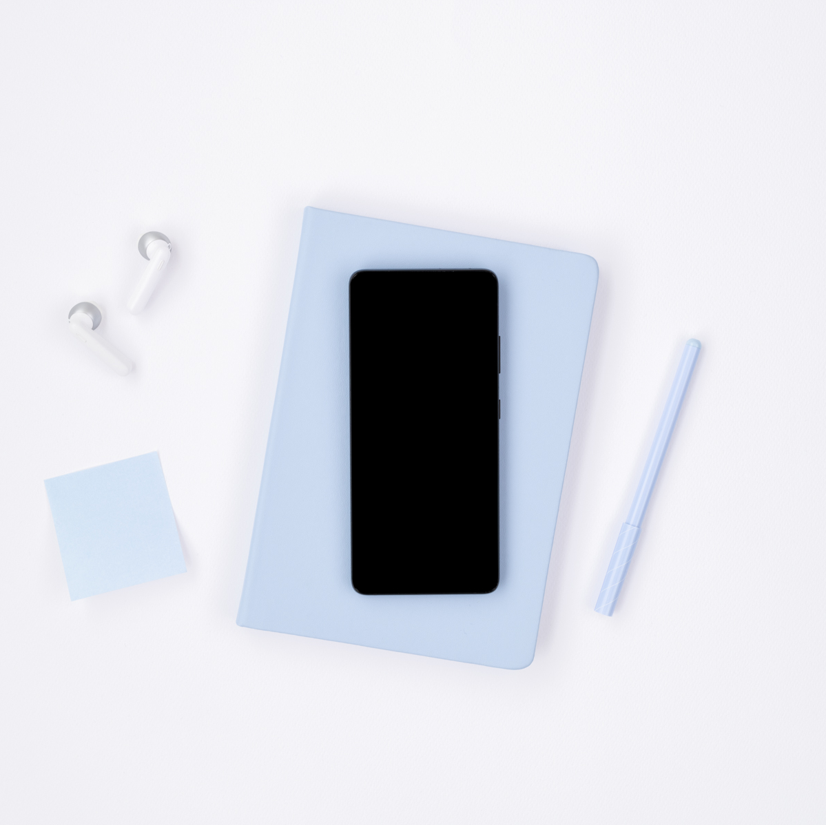 mobile on blue journal
