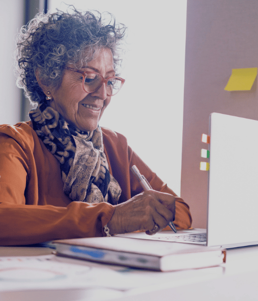 Indigenous woman at laptop best AI for principals